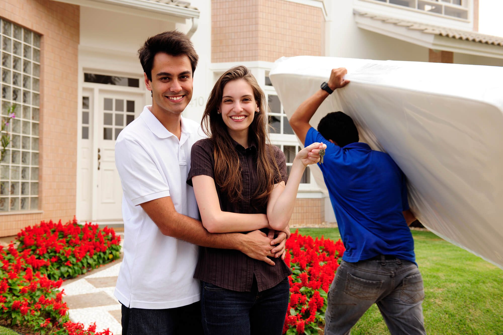 happy couple after hiring local moving companies in west palm beach