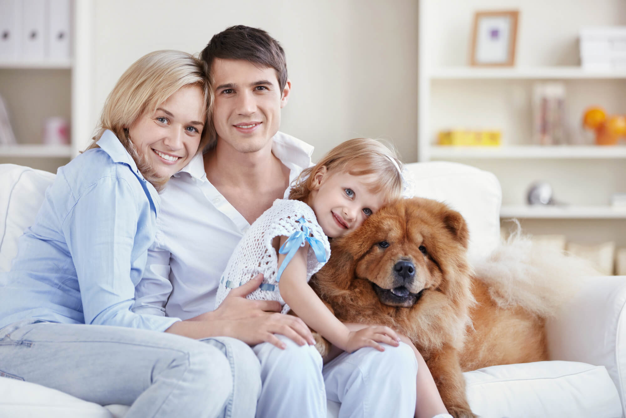 a family and their pet in after moving to their new place with the help of movers west palm beach